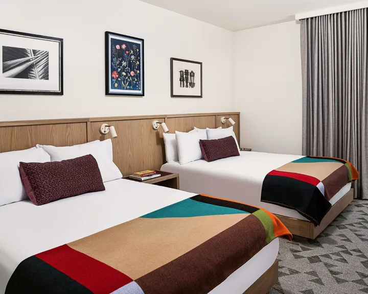 View of two queen beds in a double queen guest room