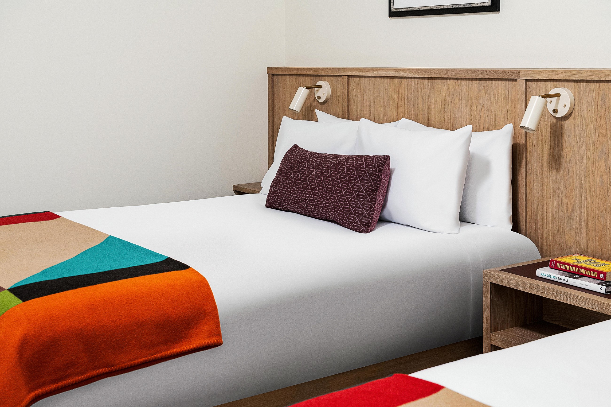 Close up of a queen bed in a guest room